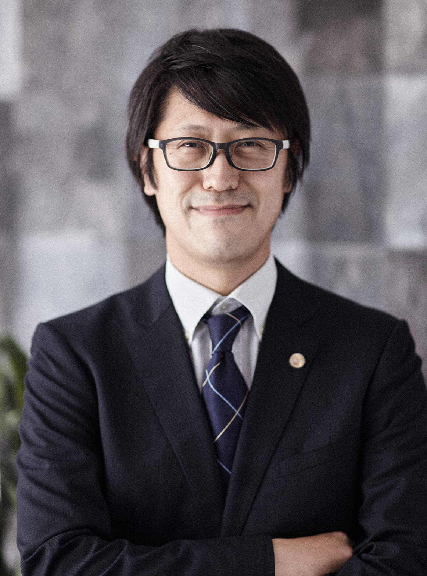 弁護士|足立賢介